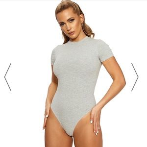 Nakedwardrobe body suit “lookin snatched bodysuit”